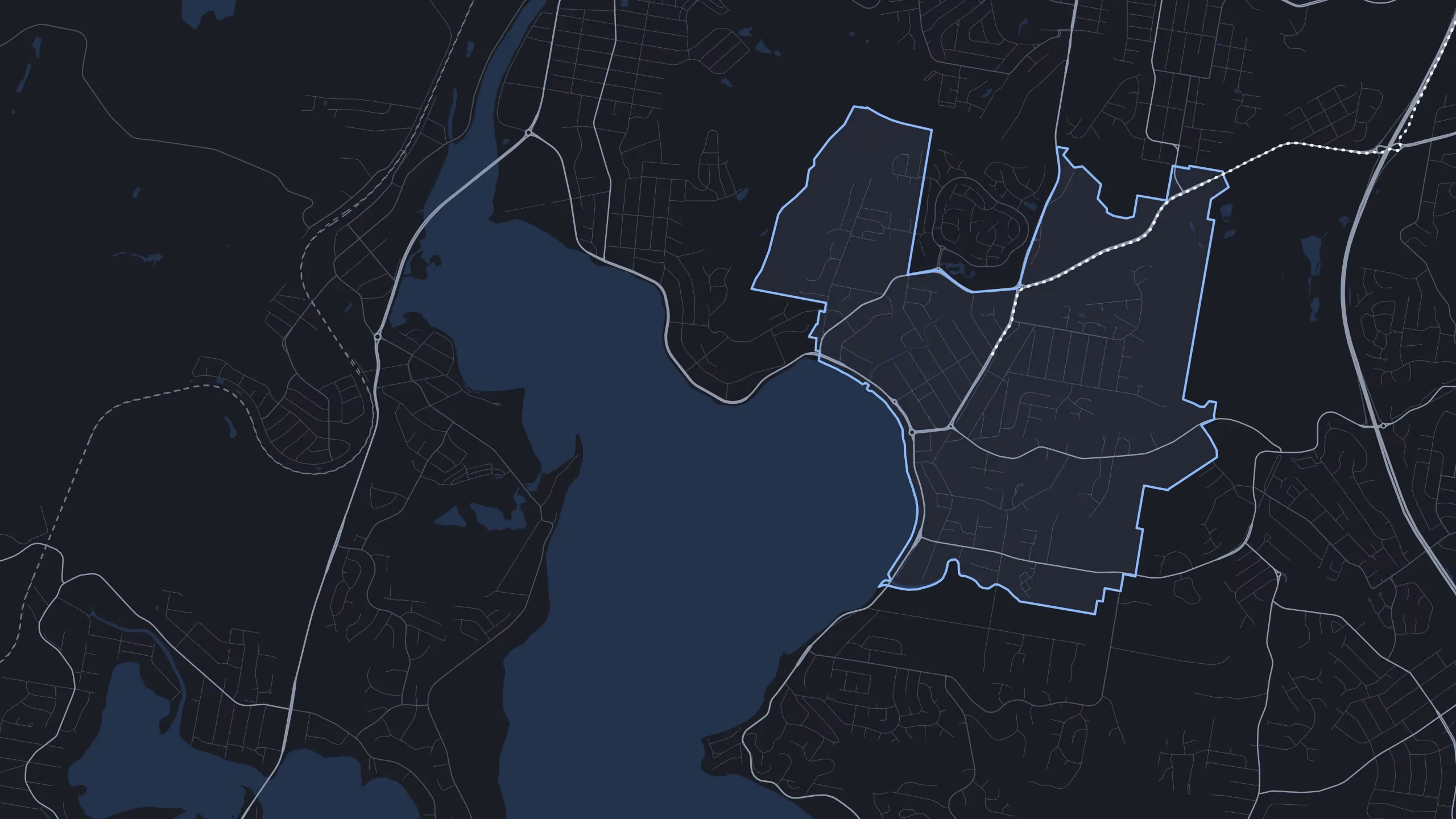 A street map of Warners Bay with the suburb outlined, and the drive in from Mayfield